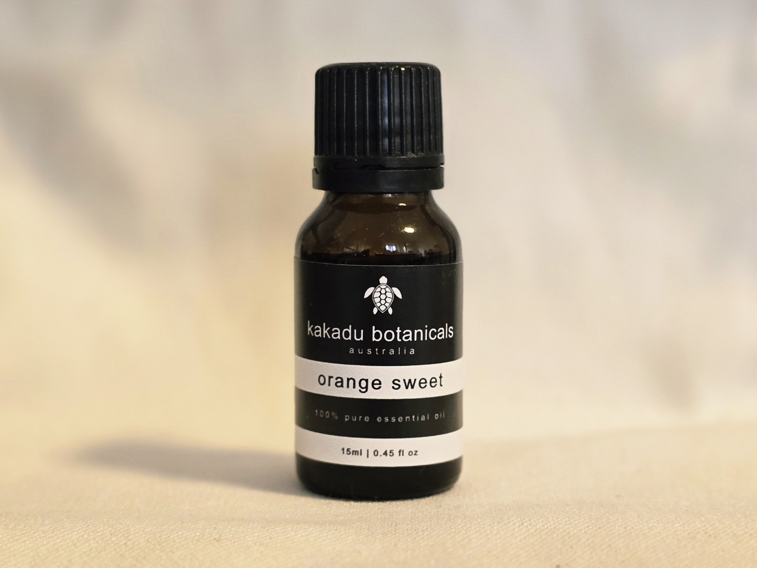 Orange Sweet Essential Oil bottle - Kakadu Botanicals, natural Australian essential oil product photo.
