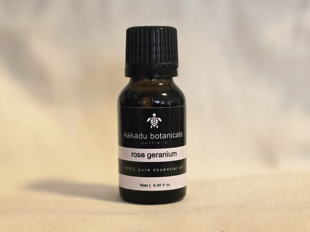 Rose Geranium Essential Oil bottle by Kakadu Botanicals - minimalist, natural Australian branding.